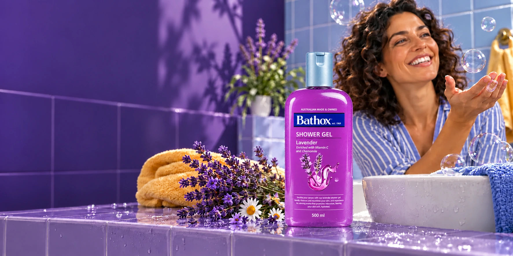 Lavender with a smiling woman, bubbles and vivid purple bathroom tiles.